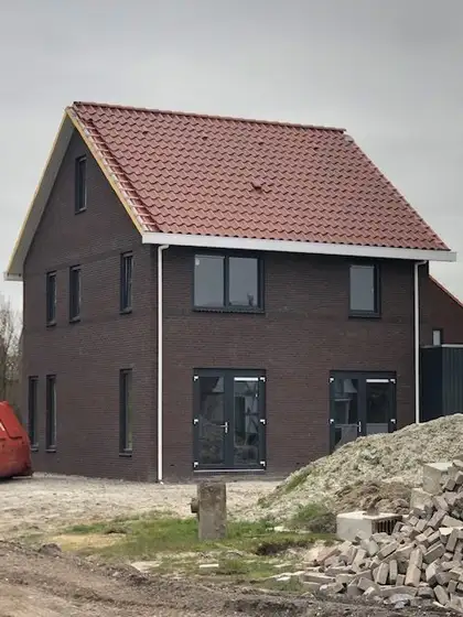 Energie neutrale nieuwbouw woning met zonneboiler en pelletketel in Witmarsum — afbeelding 3